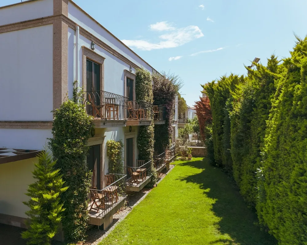 Deluxe Tek Büyük veya İki Ayrı Yataklı Oda, 1 Çift Kişilik veya 2 Tek Kişilik Yatak, Balkon