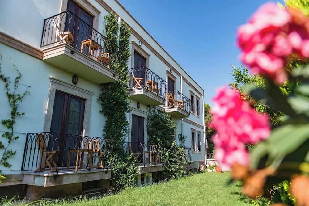 Deluxe Tek Büyük veya İki Ayrı Yataklı Oda, 1 Çift Kişilik veya 2 Tek Kişilik Yatak, Balkon
