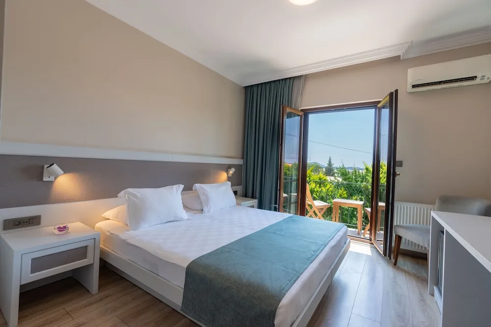 Deluxe Tek Büyük veya İki Ayrı Yataklı Oda, 1 Çift Kişilik veya 2 Tek Kişilik Yatak, Balkon