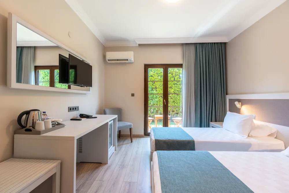 Deluxe Tek Büyük veya İki Ayrı Yataklı Oda, 1 Çift Kişilik veya 2 Tek Kişilik Yatak, Balkon