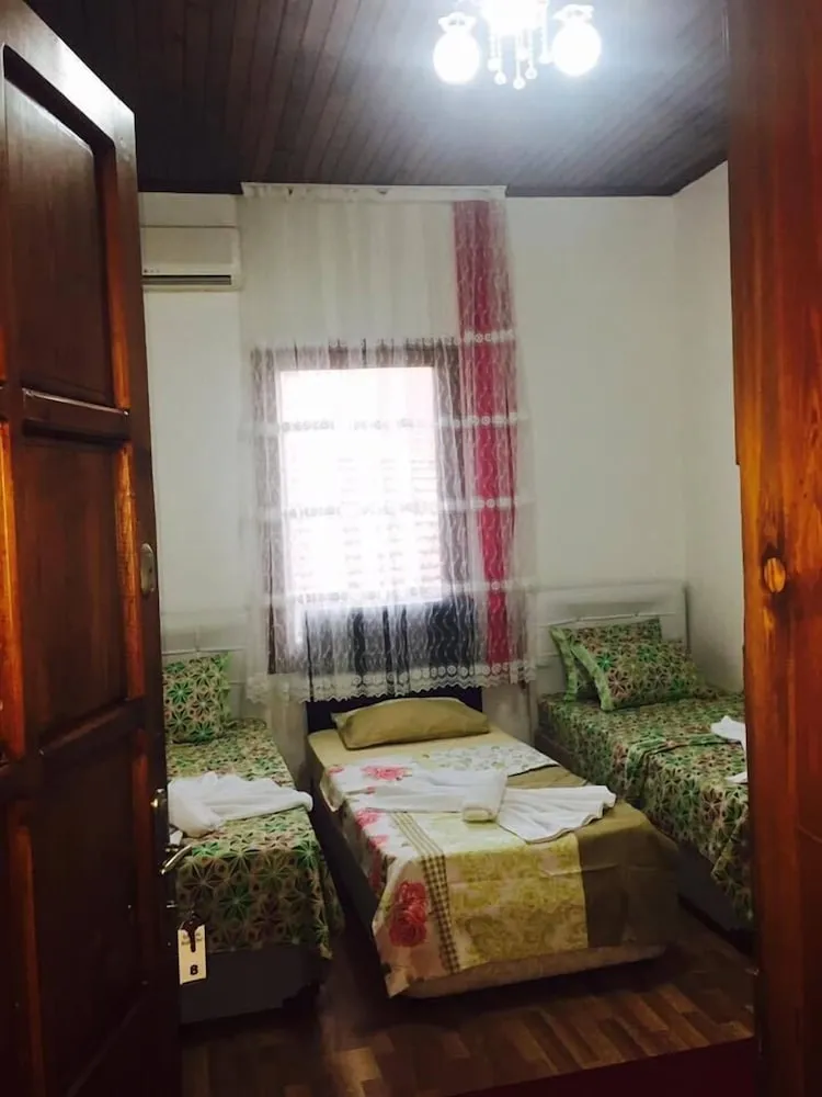 Üç Kişilik Oda