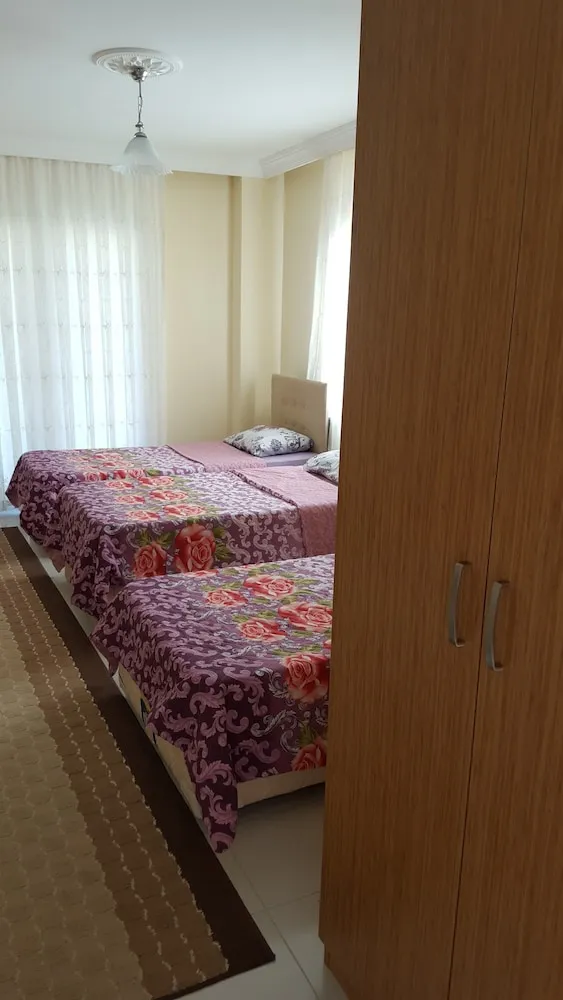 Üç Kişilik Oda, Bahçe Manzaralı