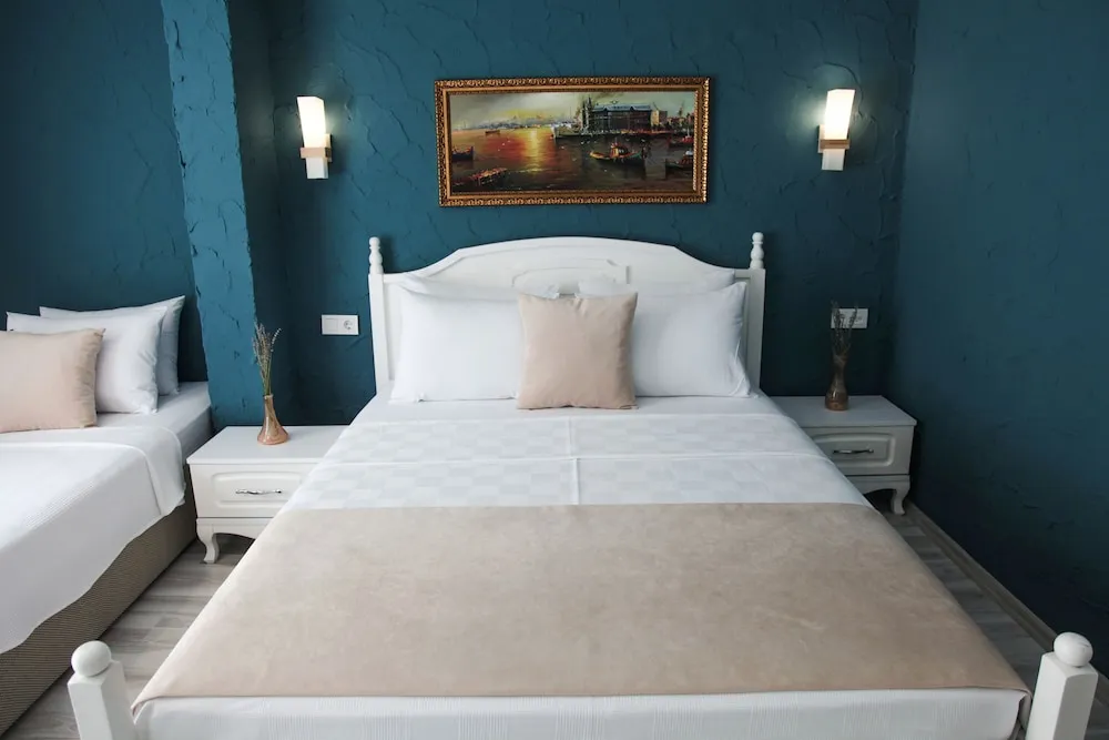 Family Üç Kişilik Oda