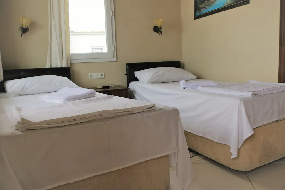 Single Iki Ayri Yatakli Oda