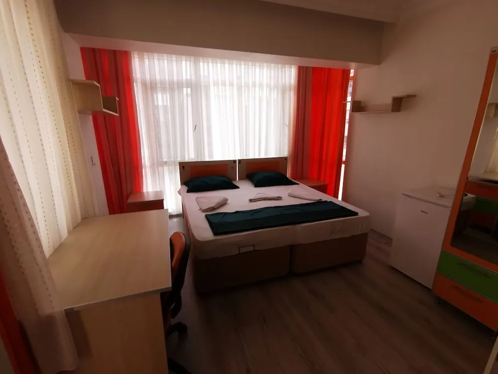 Deluxe Tek Büyük veya İki Ayrı Yataklı Oda