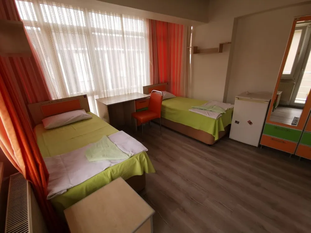 Deluxe Tek Büyük veya İki Ayrı Yataklı Oda