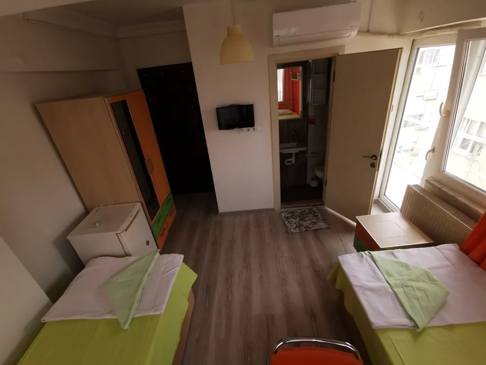 Deluxe Tek Büyük veya İki Ayrı Yataklı Oda