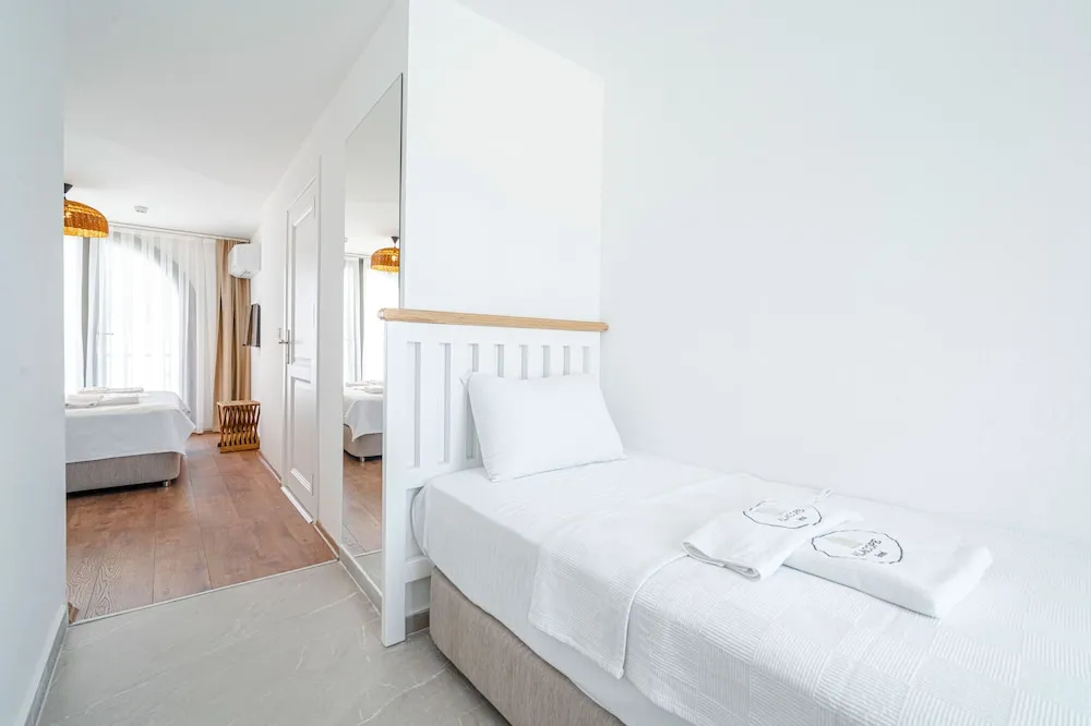 Deluxe Üç Kişilik Oda