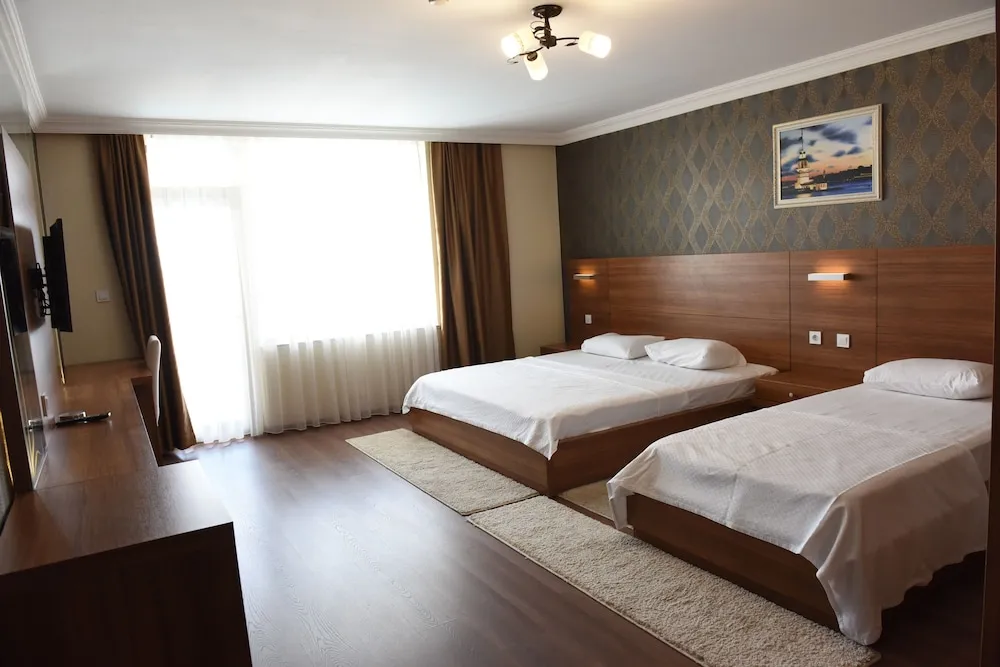 Deluxe Üç Kişilik Oda, Birden Çok Yatak