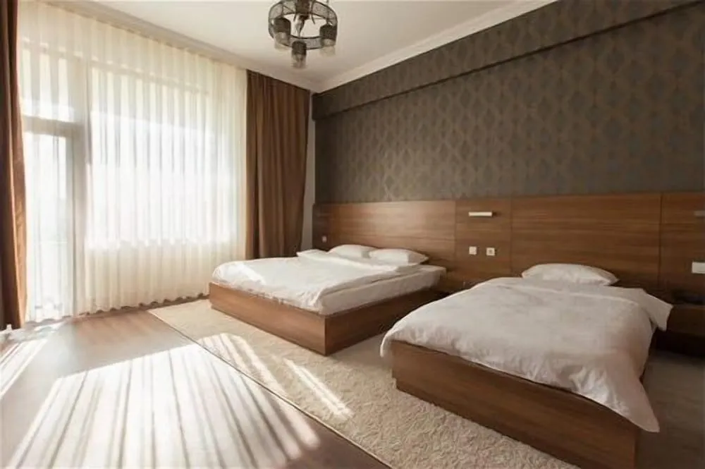 Deluxe Üç Kişilik Oda, Birden Çok Yatak
