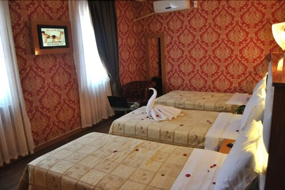 Economy Üç Kişilik Oda