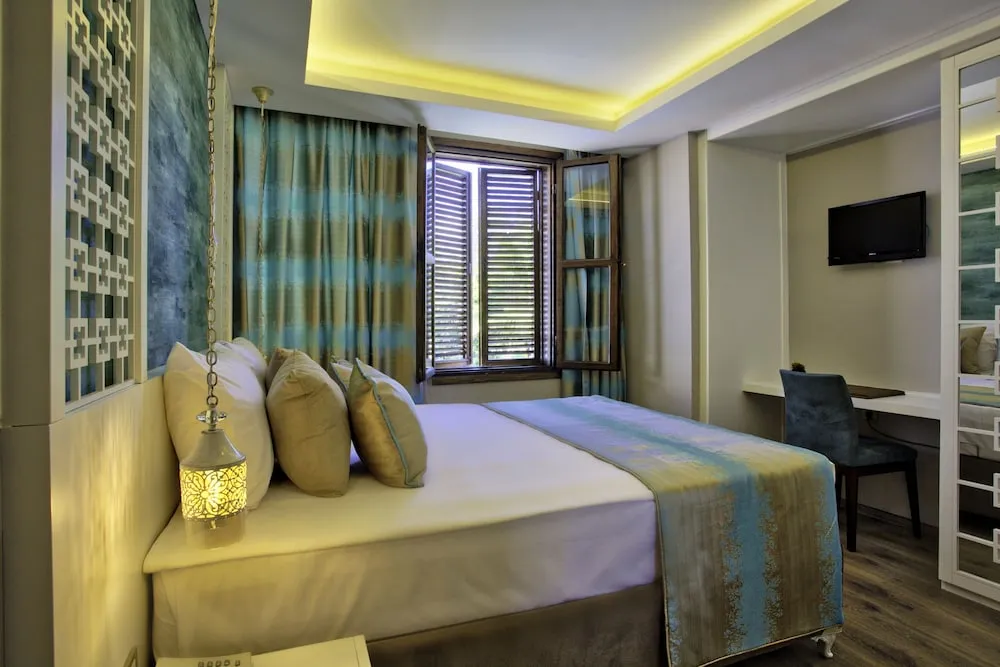 Deluxe Üç Kişilik Oda