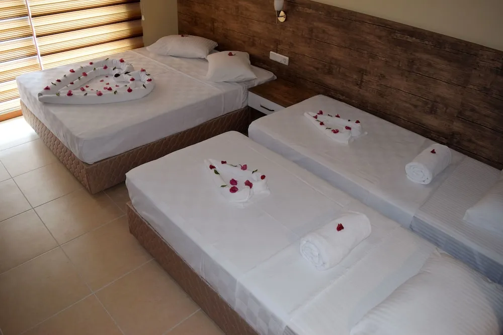 Deluxe Dört Kişilik Oda