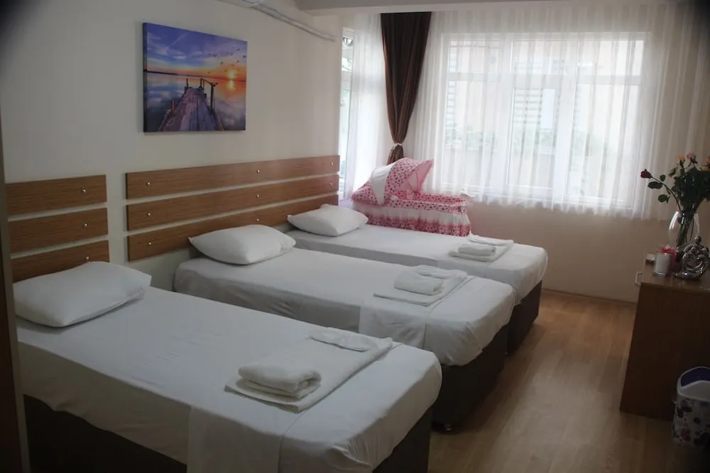 Standard Üç Kişilik Oda, 3 Tek Kişilik Yatak