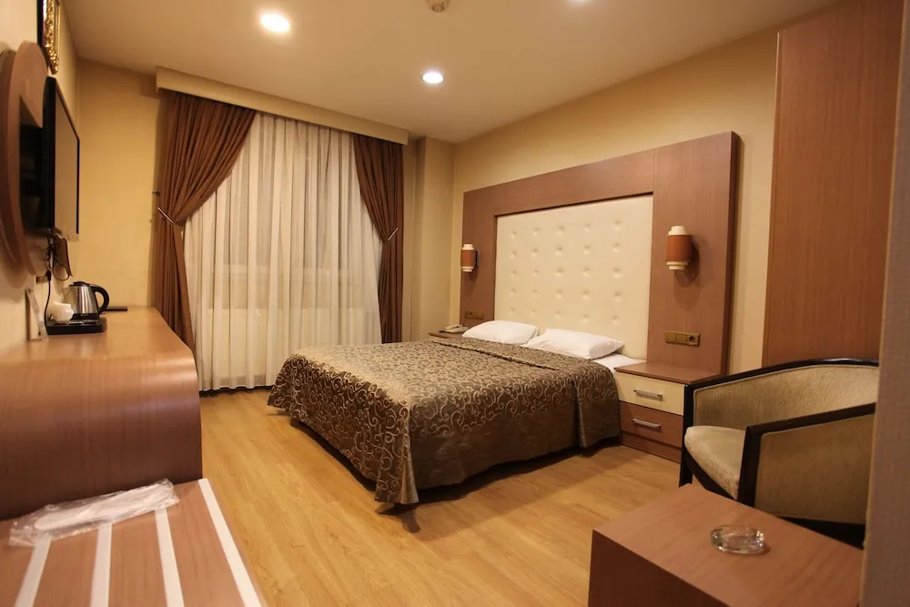 Deluxe Tek Büyük veya İki Ayrı Yataklı Oda