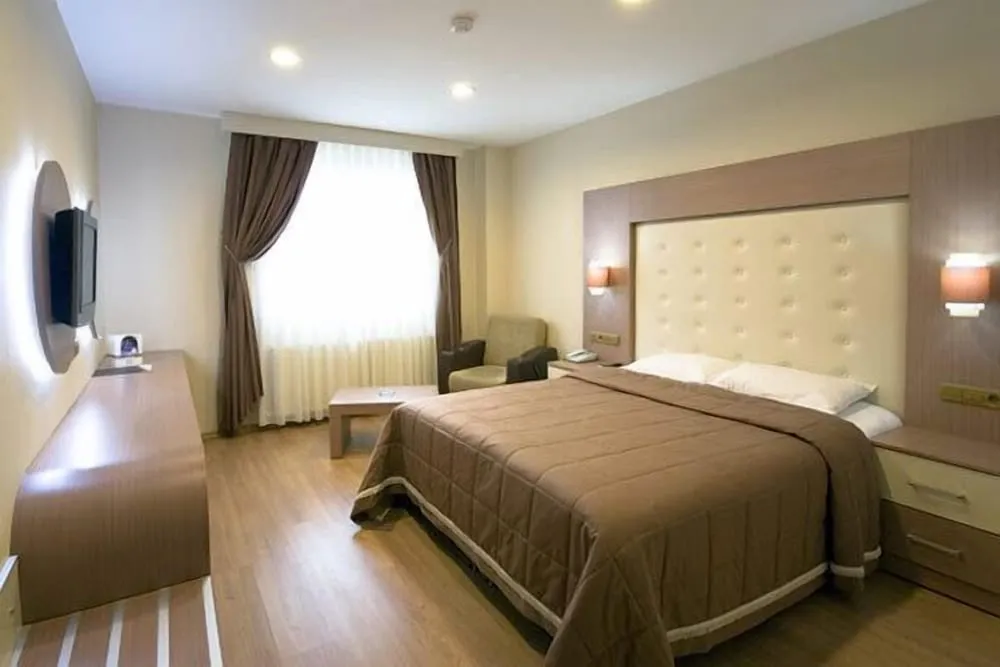 Deluxe Tek Büyük veya İki Ayrı Yataklı Oda