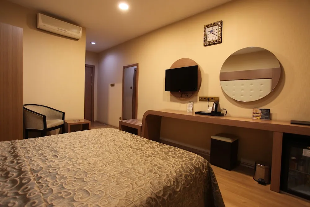 Deluxe Tek Büyük veya İki Ayrı Yataklı Oda