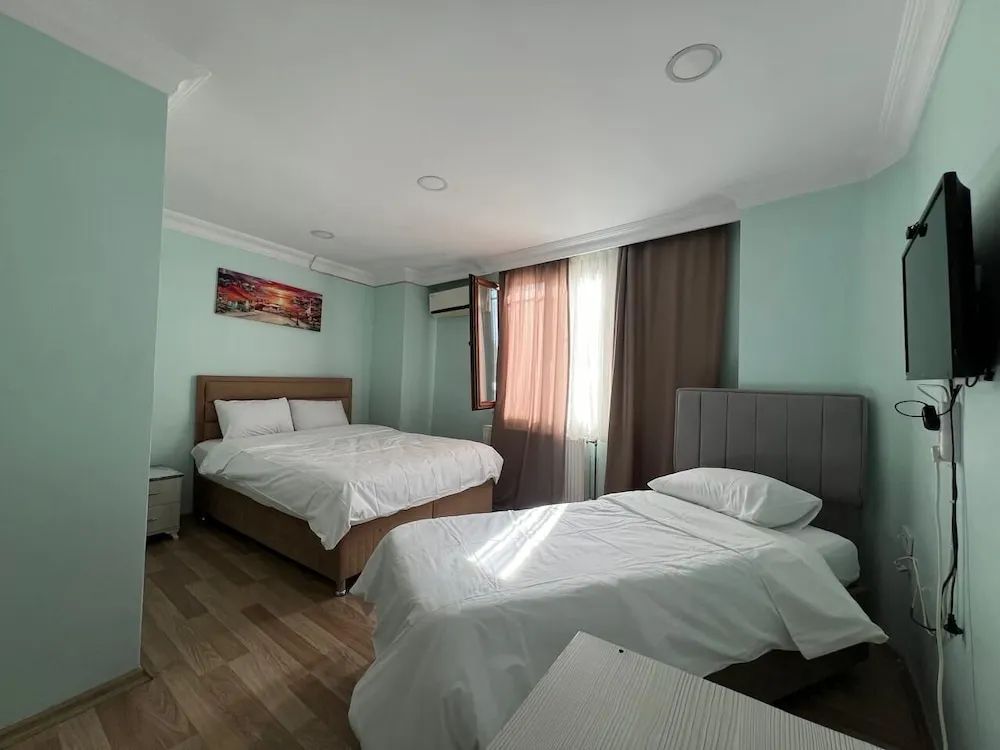Economy Üç Kişilik Oda, Şehir Manzaralı