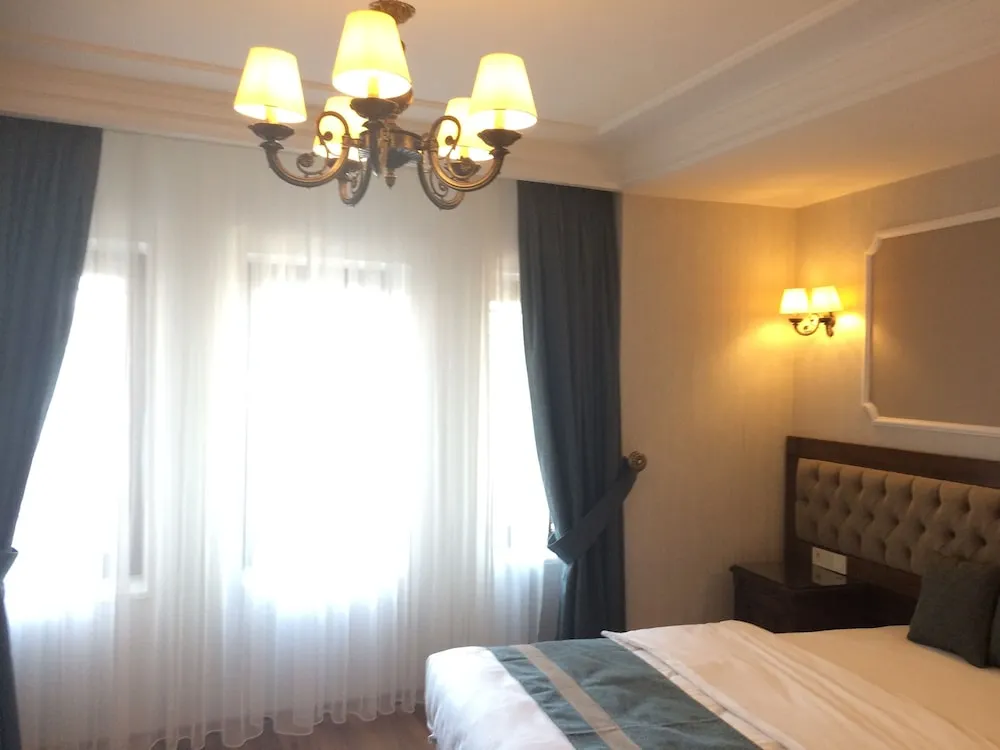 Deluxe Tek Büyük Yataklı Oda, Kısmi Deniz Manzaralı