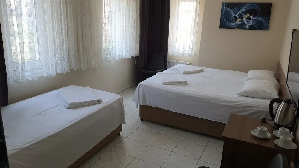 Deluxe Üç Kişilik Oda