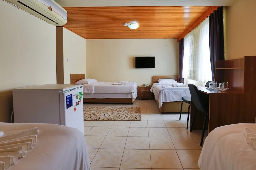 Deluxe Üç Kişilik Oda