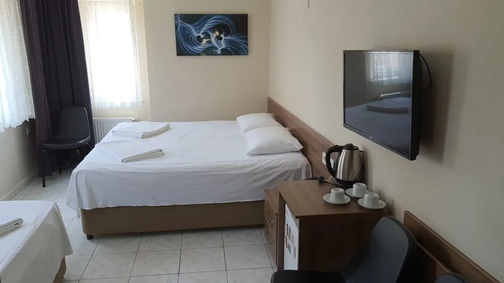 Deluxe Üç Kişilik Oda