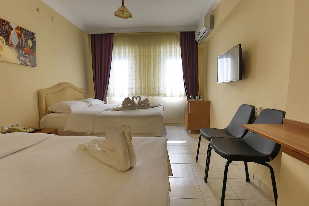 Deluxe Üç Kişilik Oda