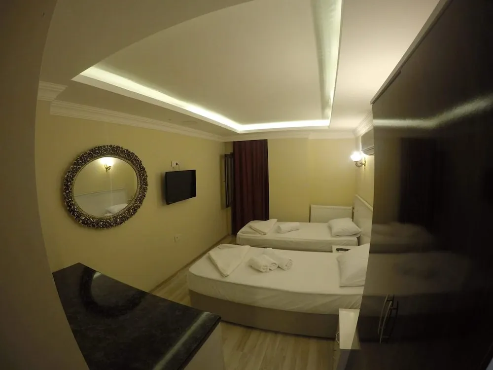 Deluxe Tek Büyük veya İki Ayrı Yataklı Oda