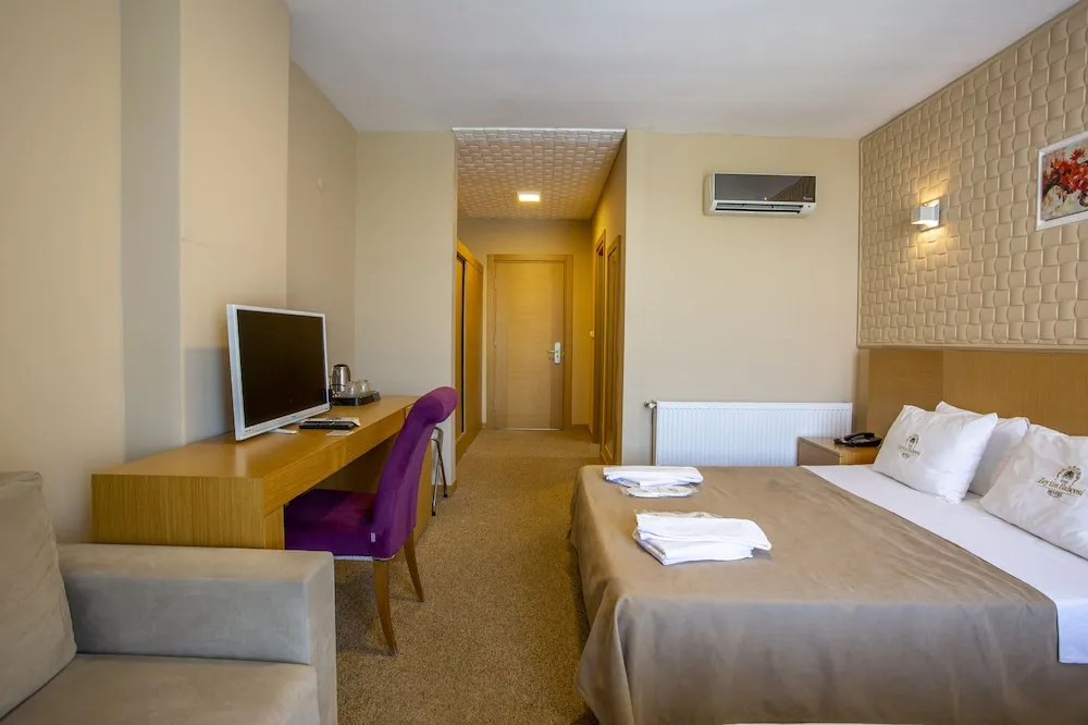 Deluxe Üç Kişilik Oda