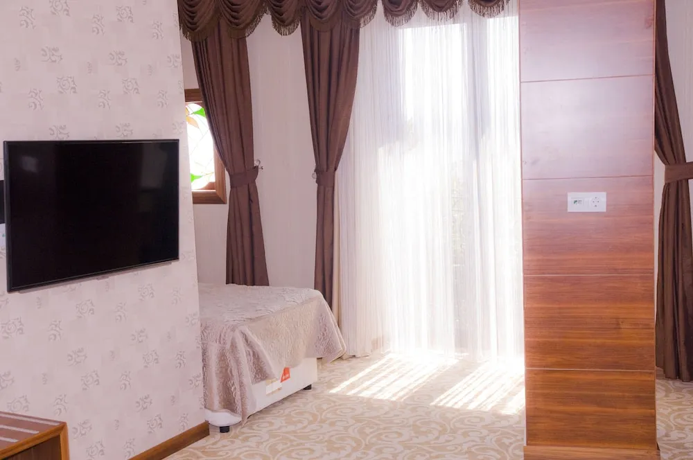 Deluxe Üç Kişilik Oda