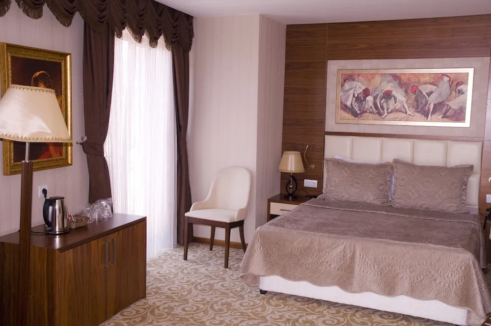 Deluxe Üç Kişilik Oda