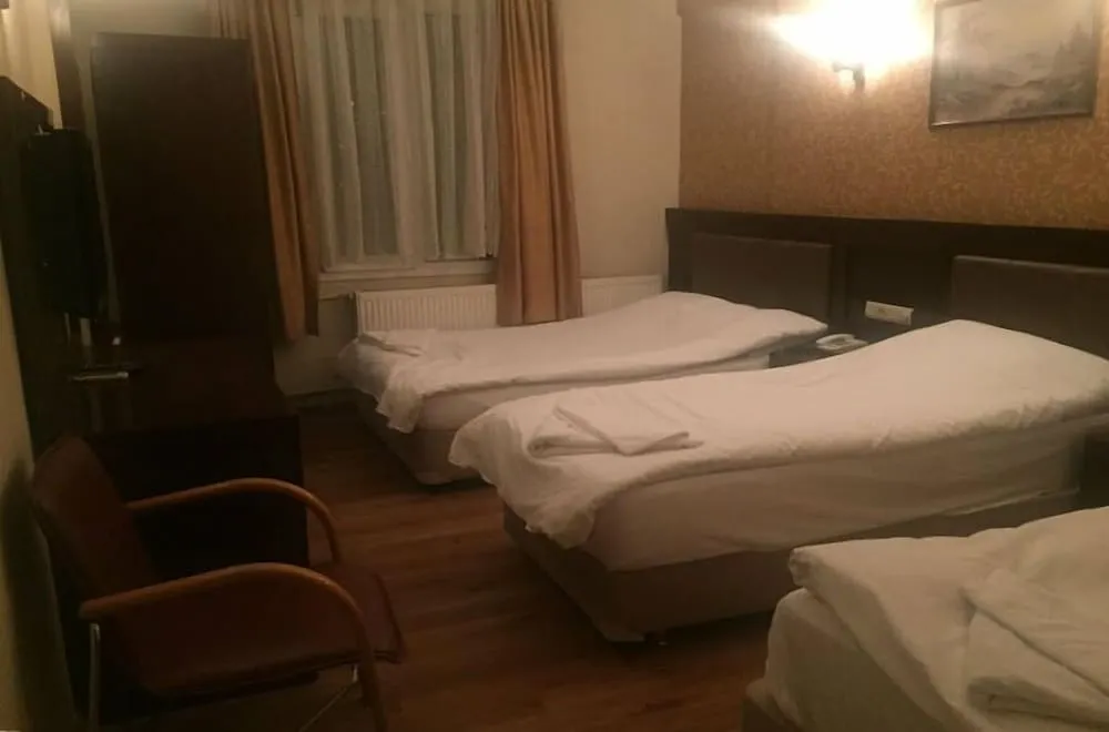 Üç Kişilik Oda